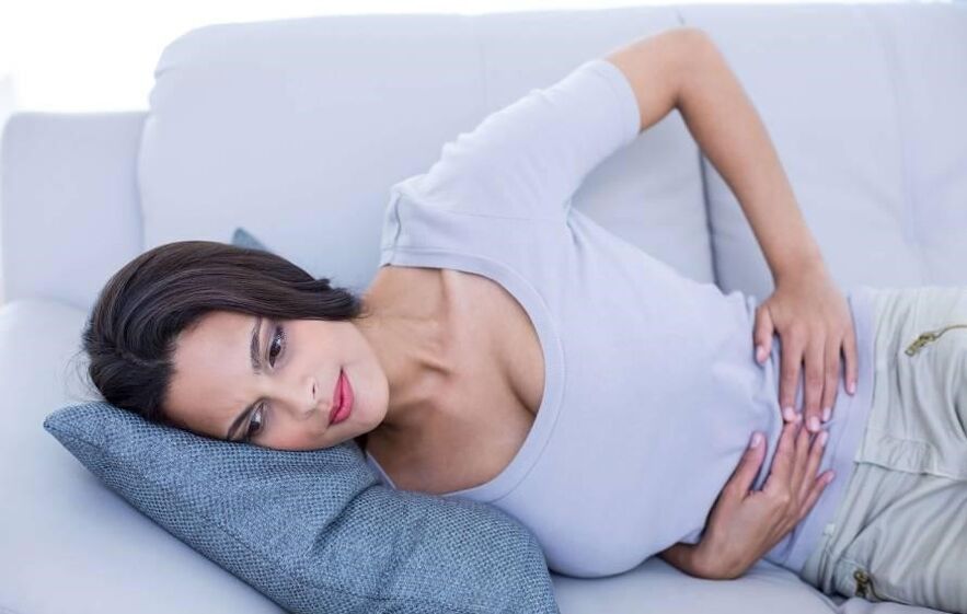 Síntomas de cistitis en una mujer